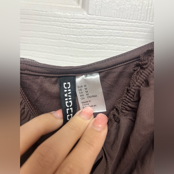 2 for 1 bodycon ruffle dress. Brown and black and white print. - Picture 2 of 4